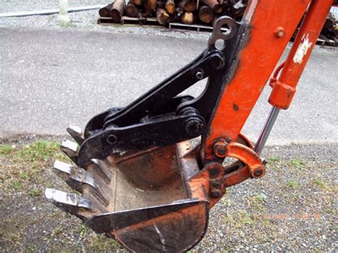 mini excavators with thumbs|mini excavator manual thumb.